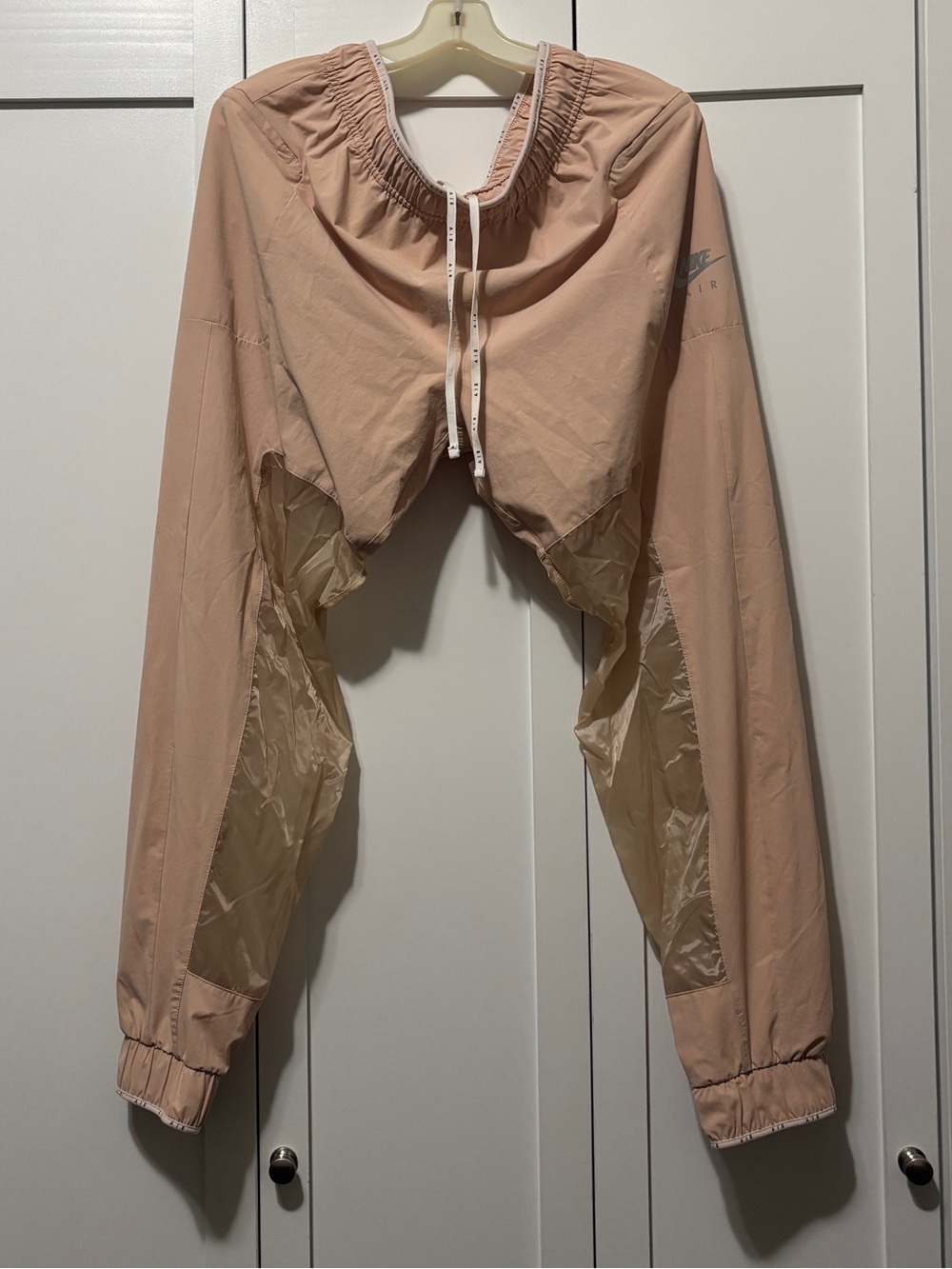Nike Air drawstring joggers with sheer panels in peach